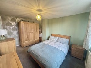 Bedroom One- click for photo gallery